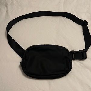 Lululemon belt bag in black.